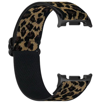 Leopard print watch band with black clasp on a white background